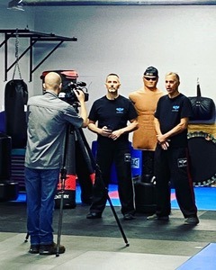 Seaside Krav Maga instructors being filmed during a media appearance